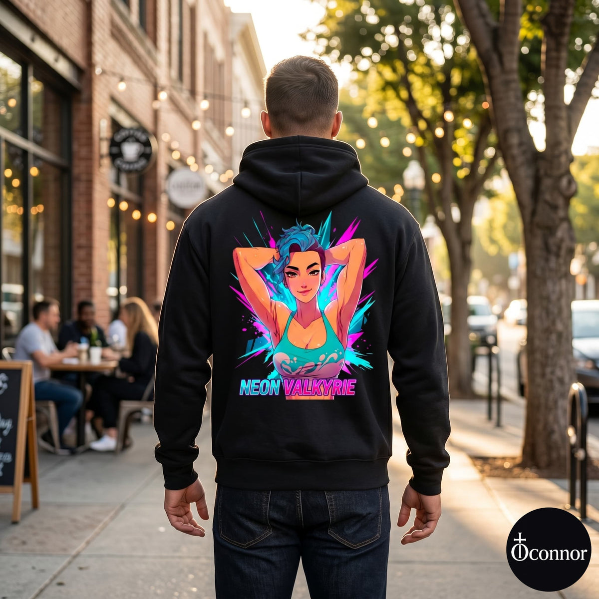 Male model wearing Neon Valkyrie black hoodie seen from behind in urban setting with anime-style elements - O'Connor streetwear