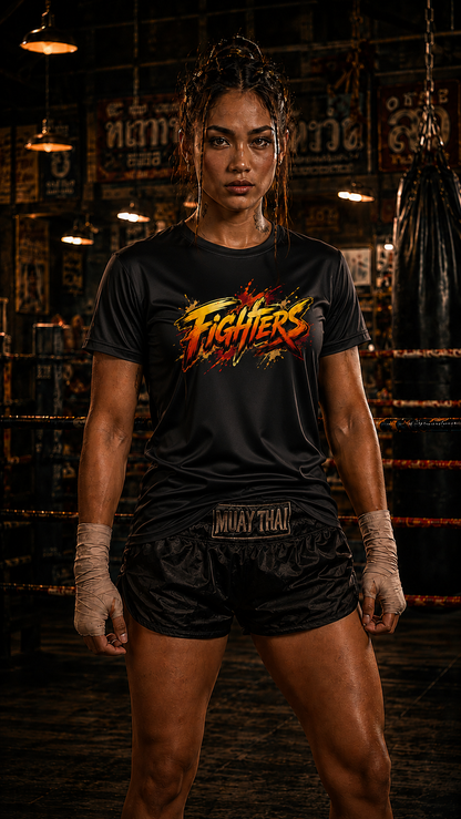 Person wearing a black 'FIGHTERS' t-shirt and black shorts with a belt in a boxing ring setting.